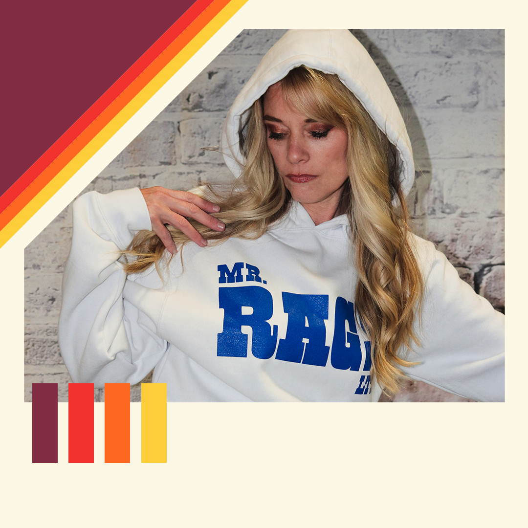 Model wearing a white Mr. Rags hoodie with blue lettering