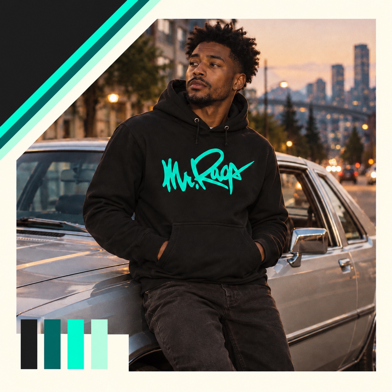 Model wearing a black Mr. Rags GEN 2 hoodie with neon teal artwork