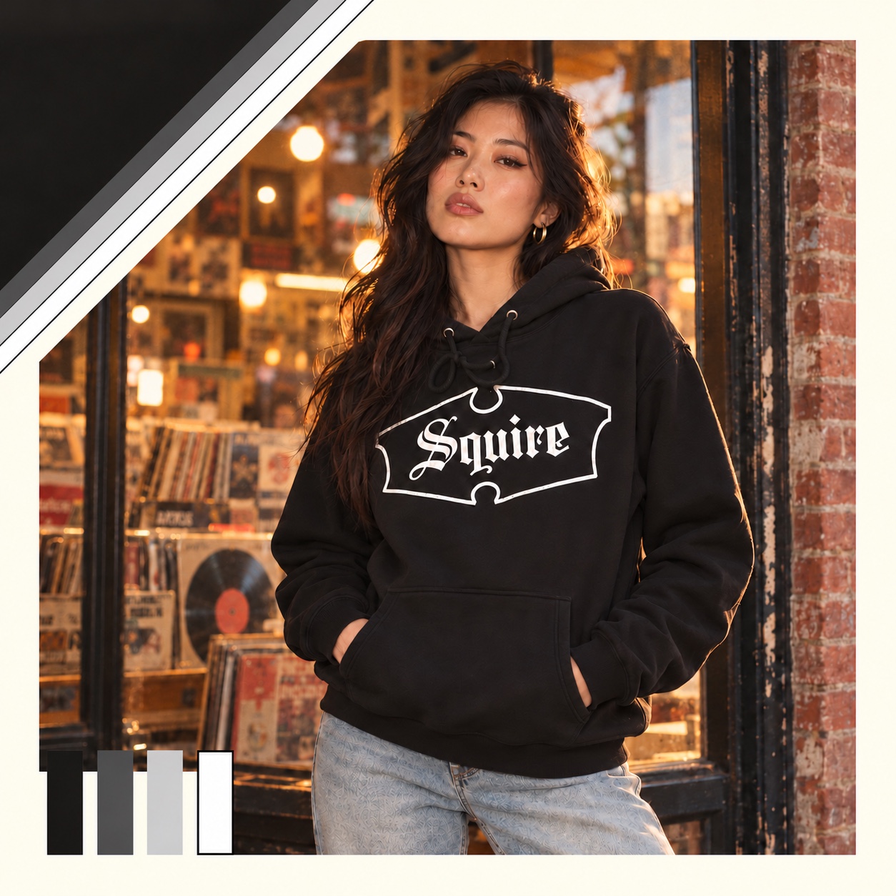 Model wearing a black Squire Gothic hoodie with white artwork